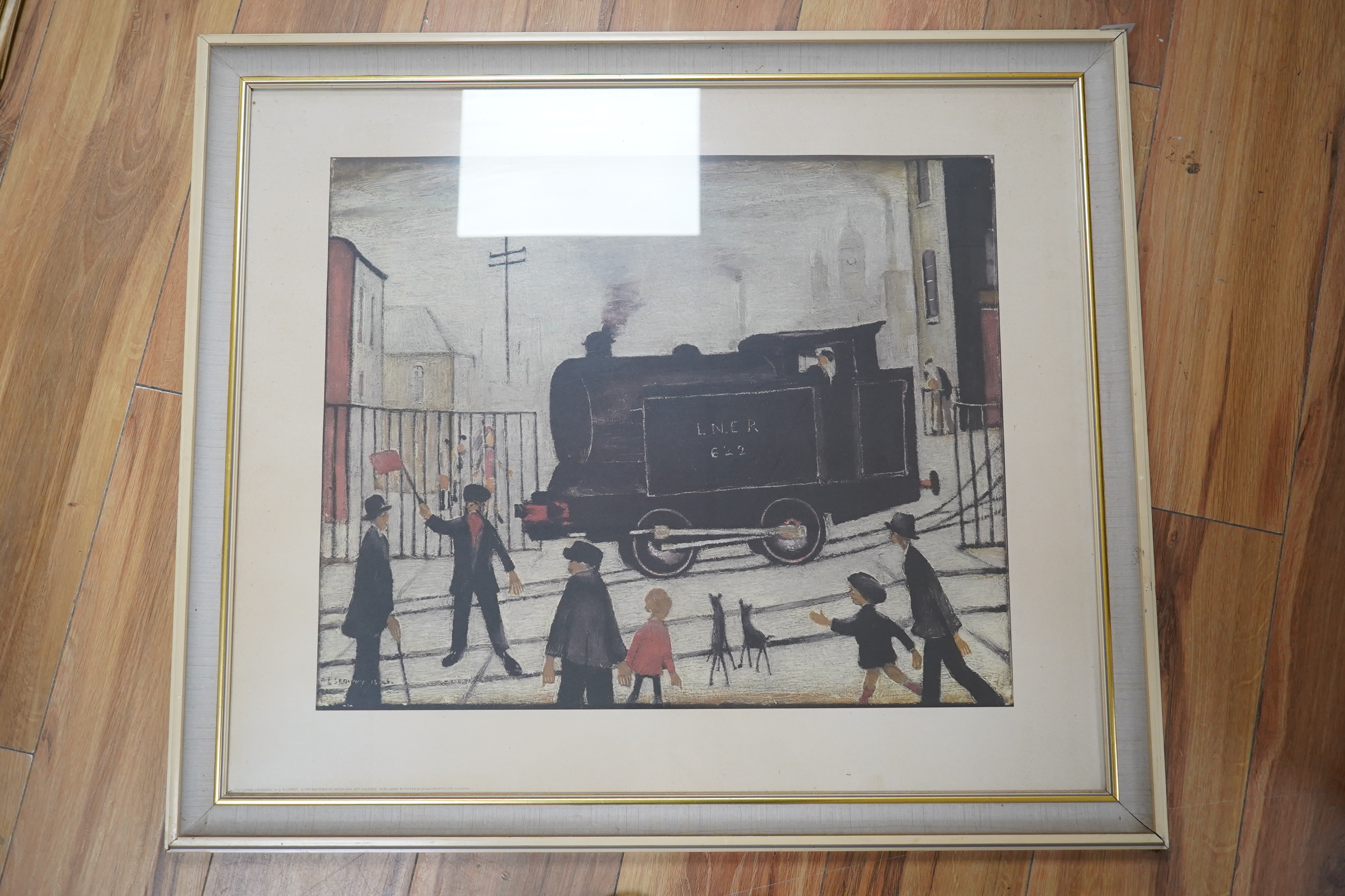 After Laurence Stephen Lowry, colour print, 'Level Crossing', 46 x 55cm. Condition - good